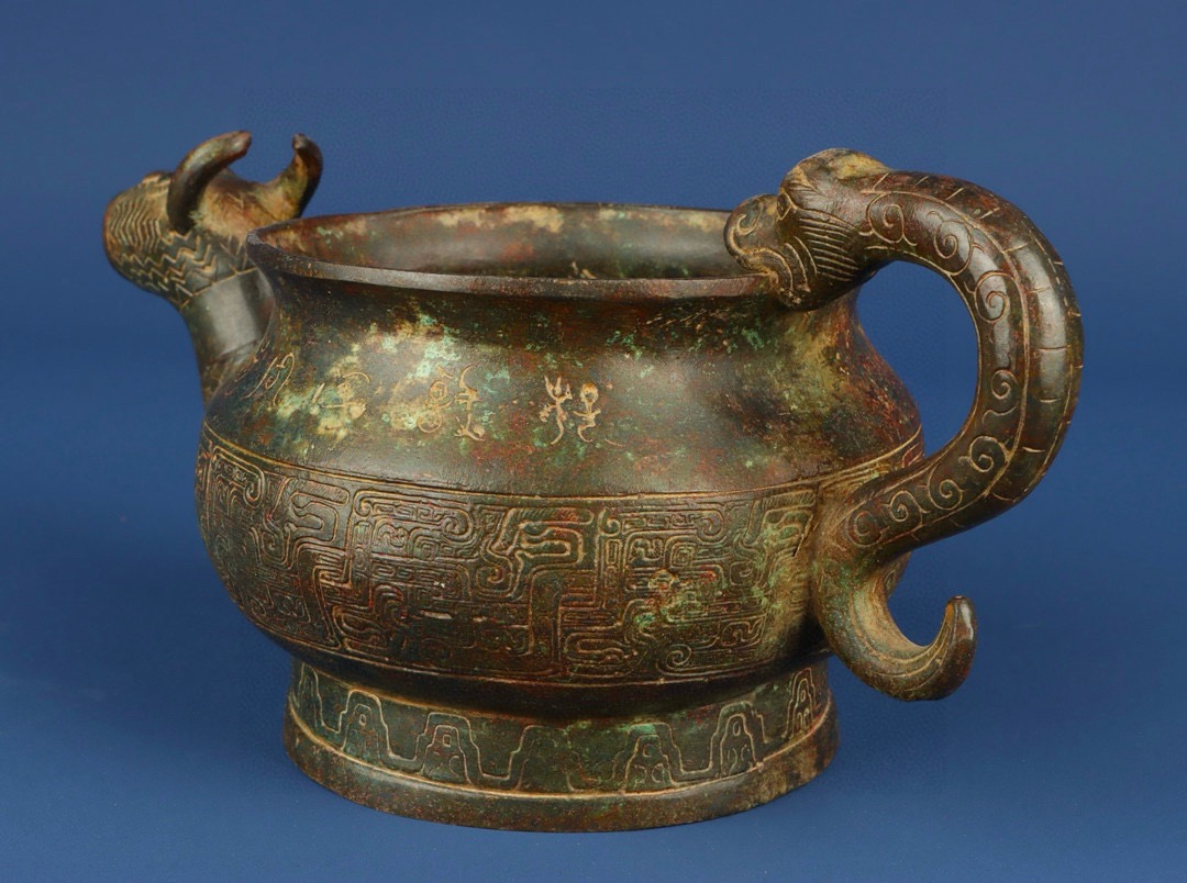Zhou Dynasty Bronze Beast Head Pot