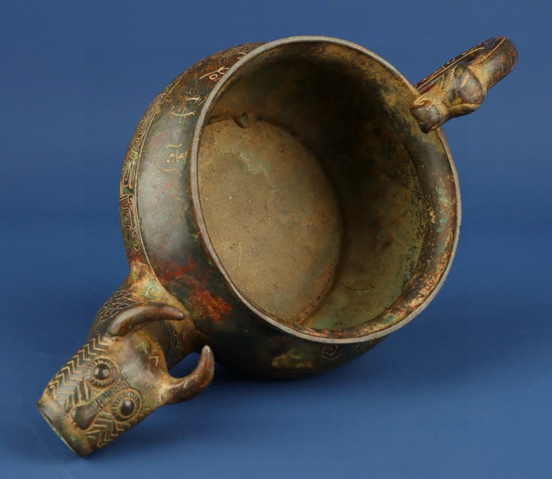 Zhou Dynasty Bronze Beast Head Pot