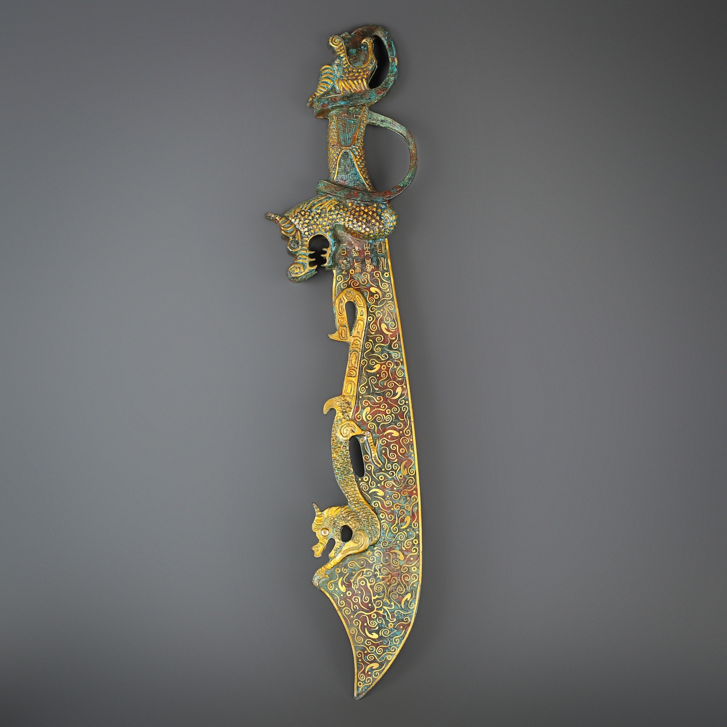 Han Dynasty Bronze and gold inscribed dragon knife