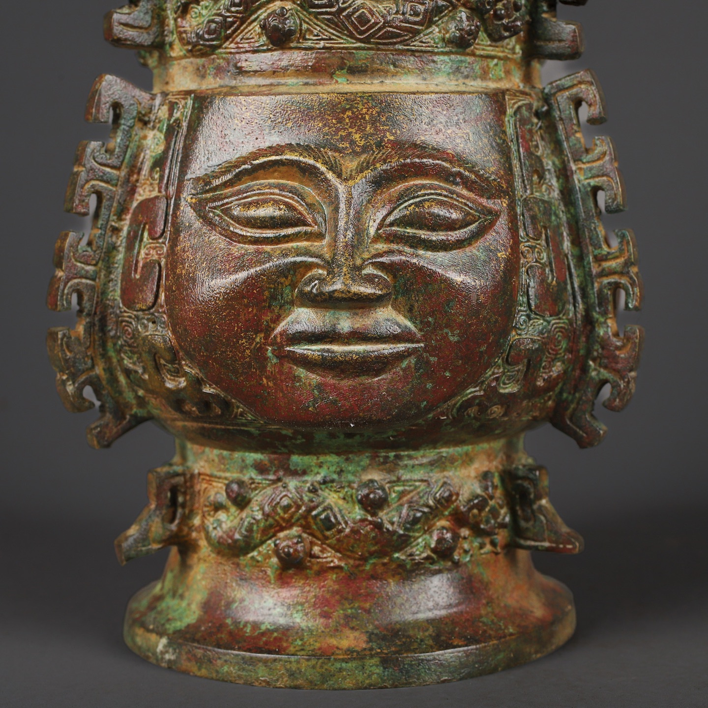 Zhou Dynasty Bronze round statue with human face