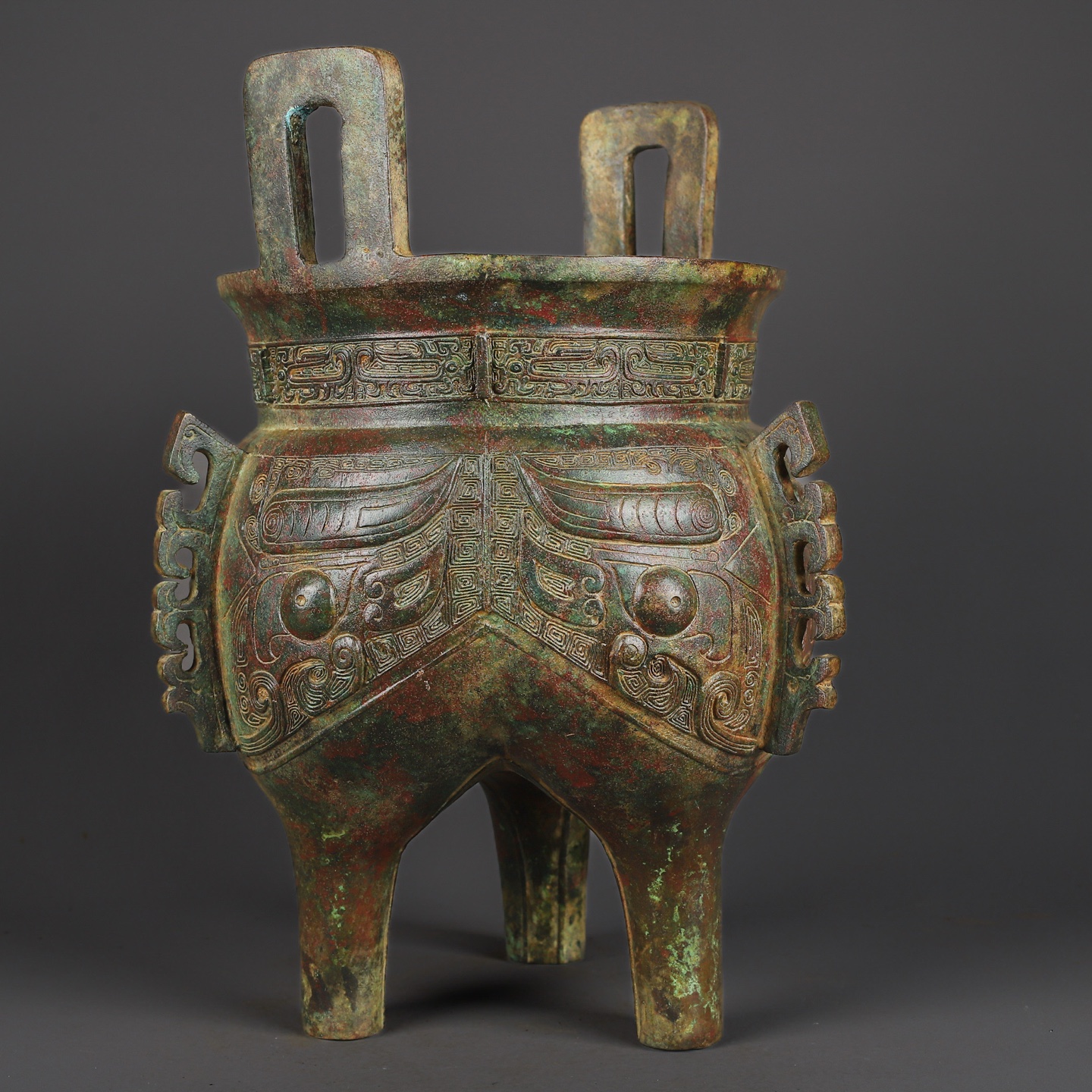 Zhou Dynasty Bronze animal faced tripod