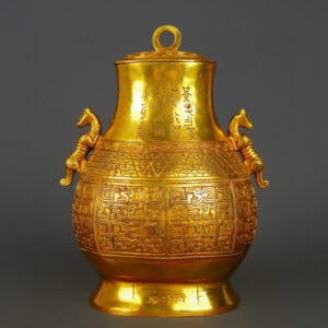 Han Dynasty gilt bronze and gold double dragon bottle