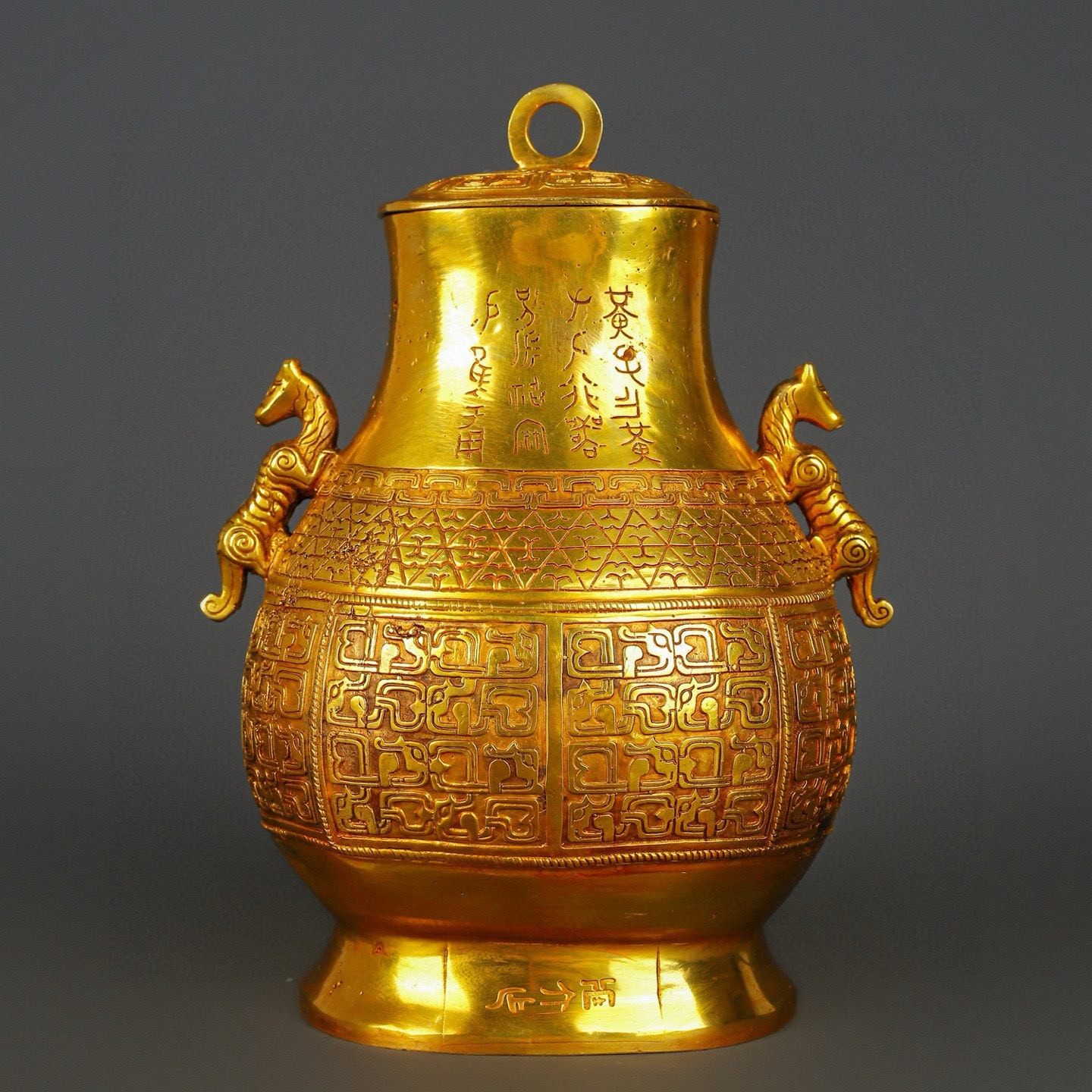 Han Dynasty gilt bronze and gold double dragon bottle