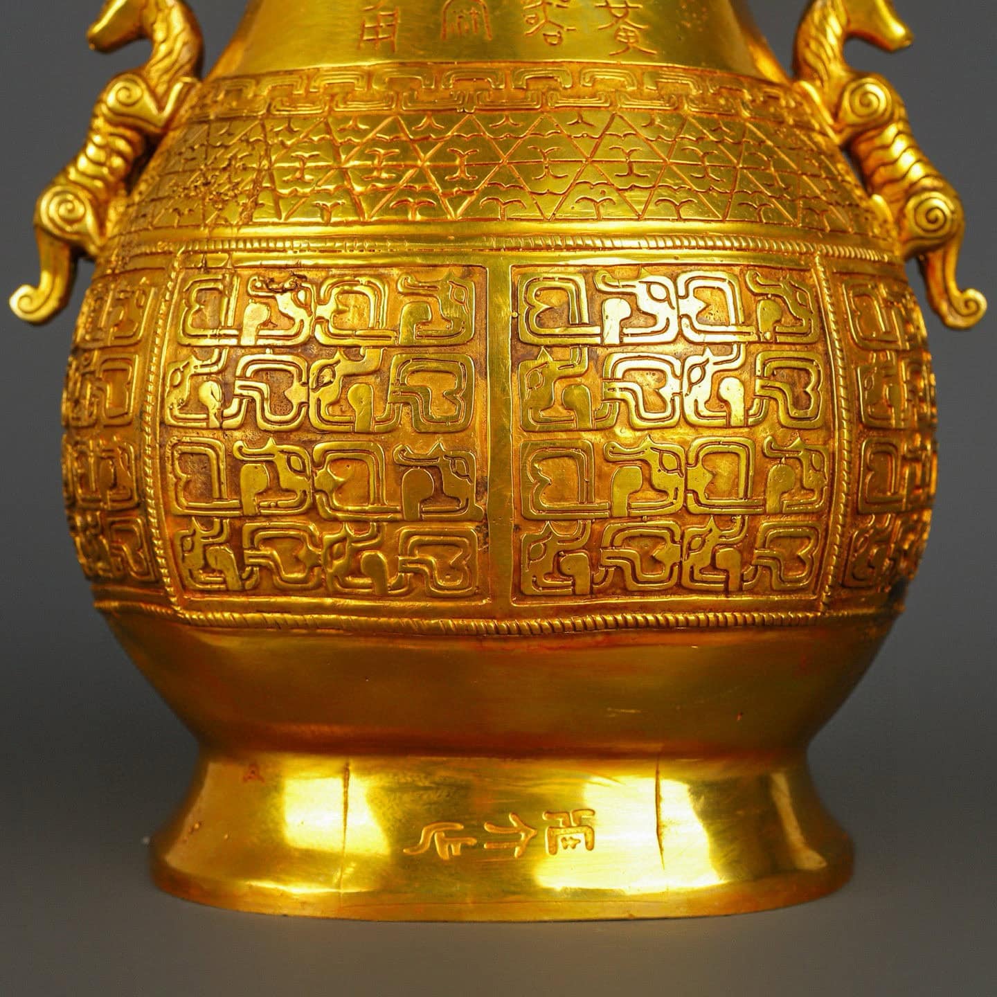 Han Dynasty gilt bronze and gold double dragon bottle