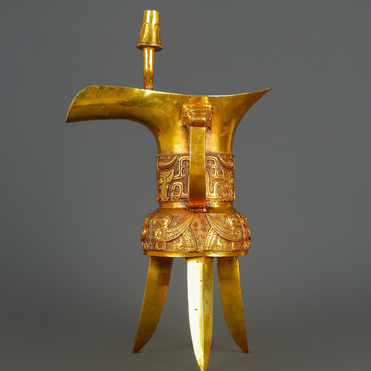 Han Dynasty gilt bronze and real gold three legged cup