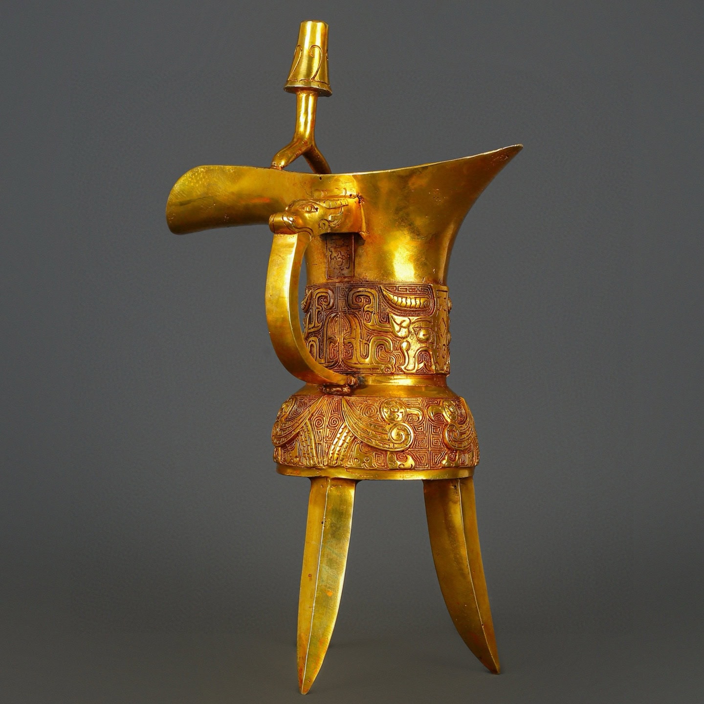 Han Dynasty gilt bronze and real gold three legged cup