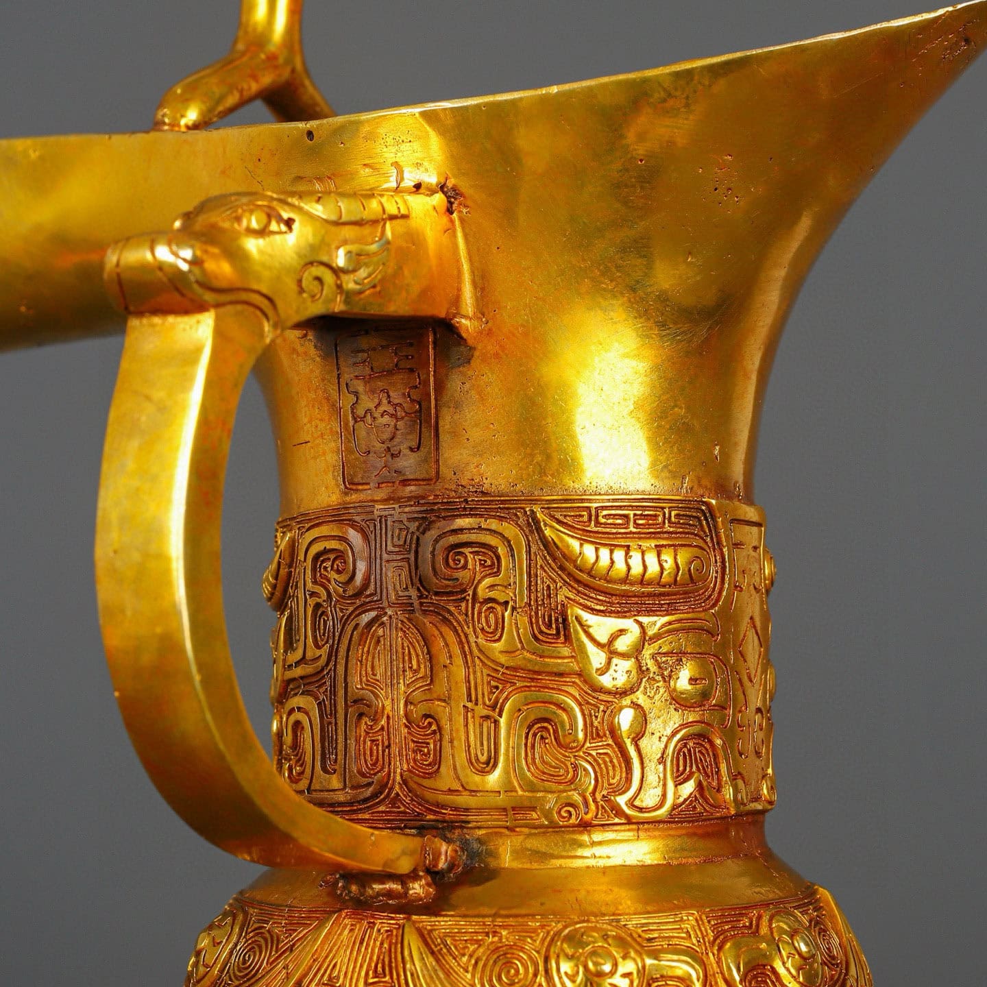 Han Dynasty gilt bronze and real gold three legged cup