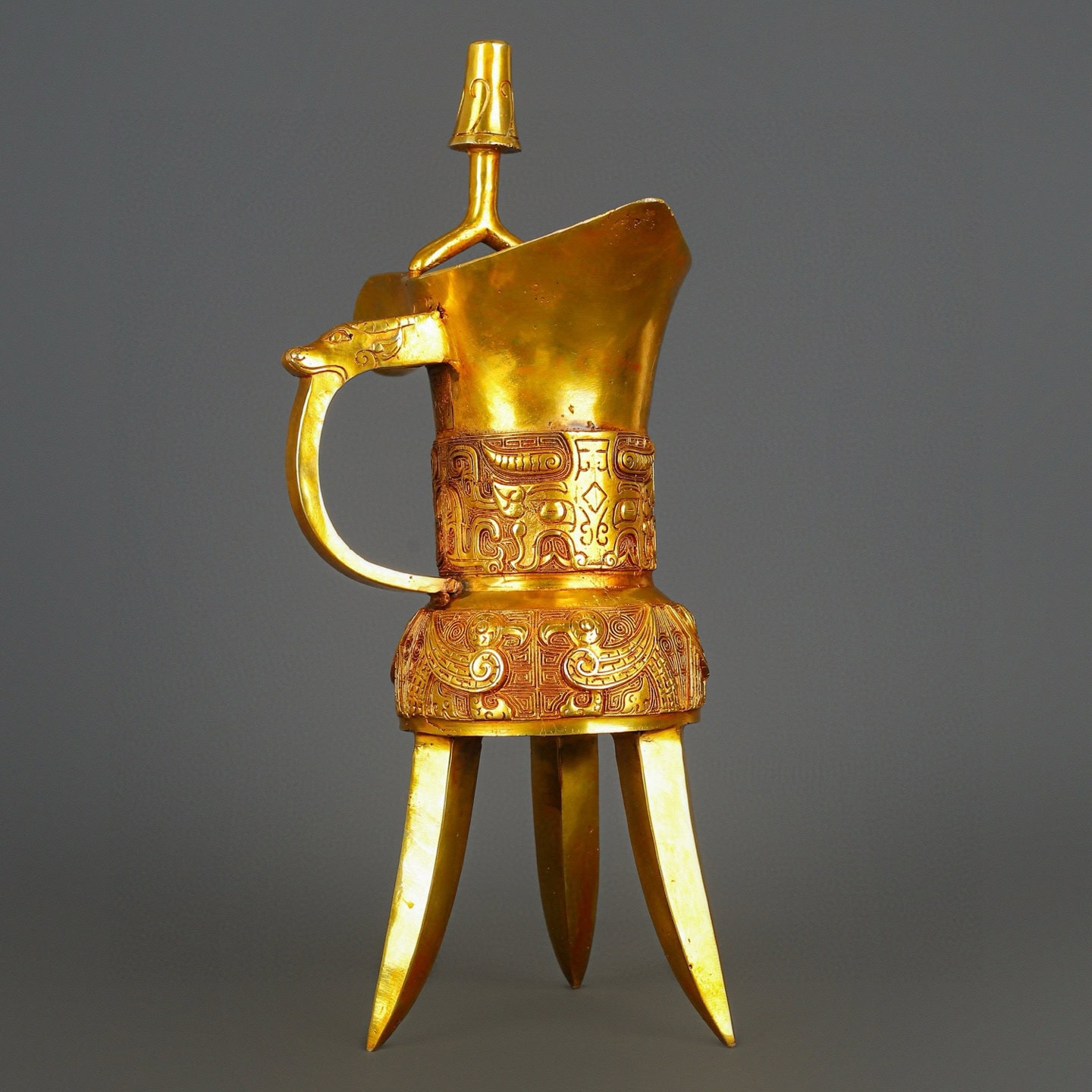 Han Dynasty gilt bronze and real gold three legged cup