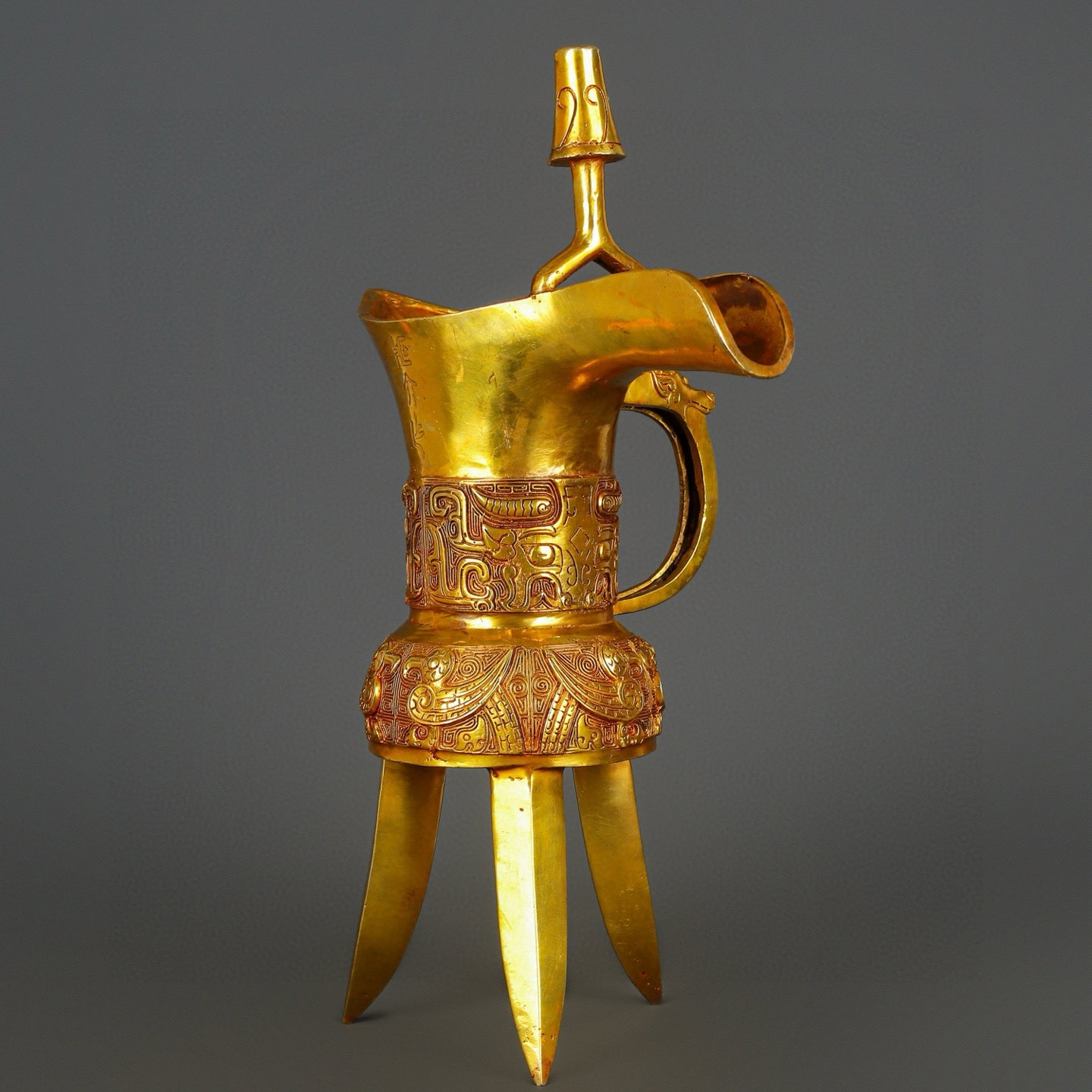 Han Dynasty gilt bronze and real gold three legged cup