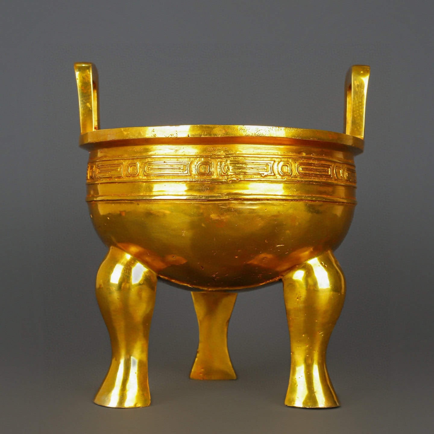 Zhou Dynasty Bronze gilt gold haired male tripod