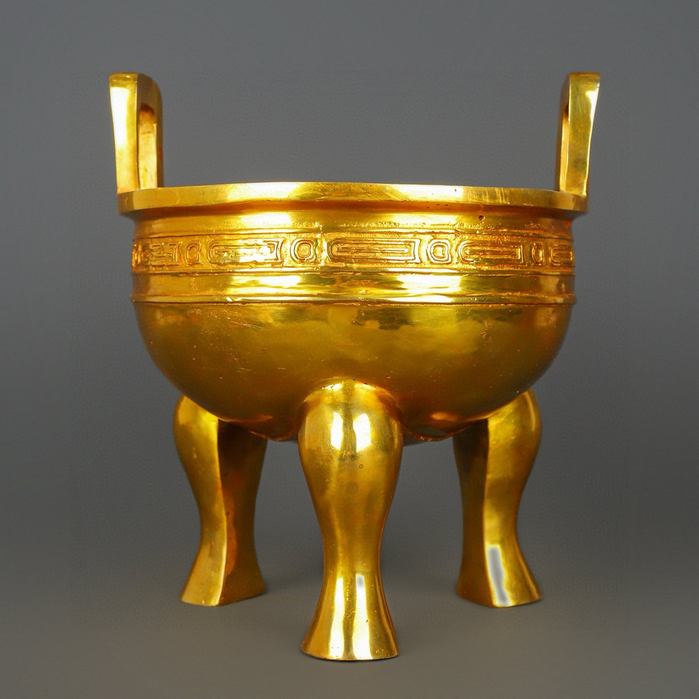 Zhou Dynasty Bronze gilt gold haired male tripod