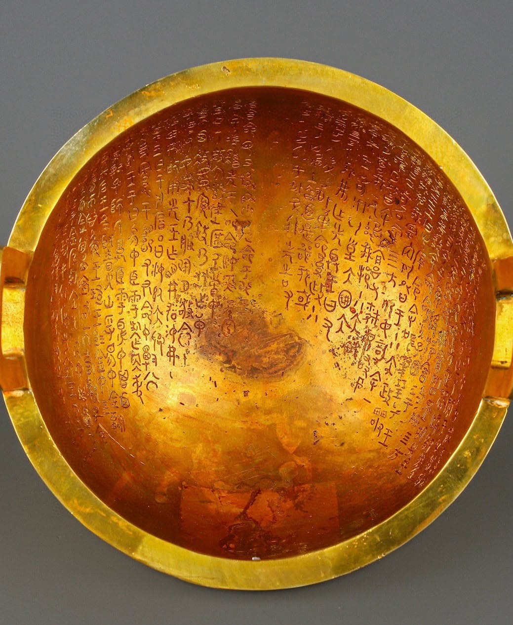 Zhou Dynasty Bronze gilt gold haired male tripod