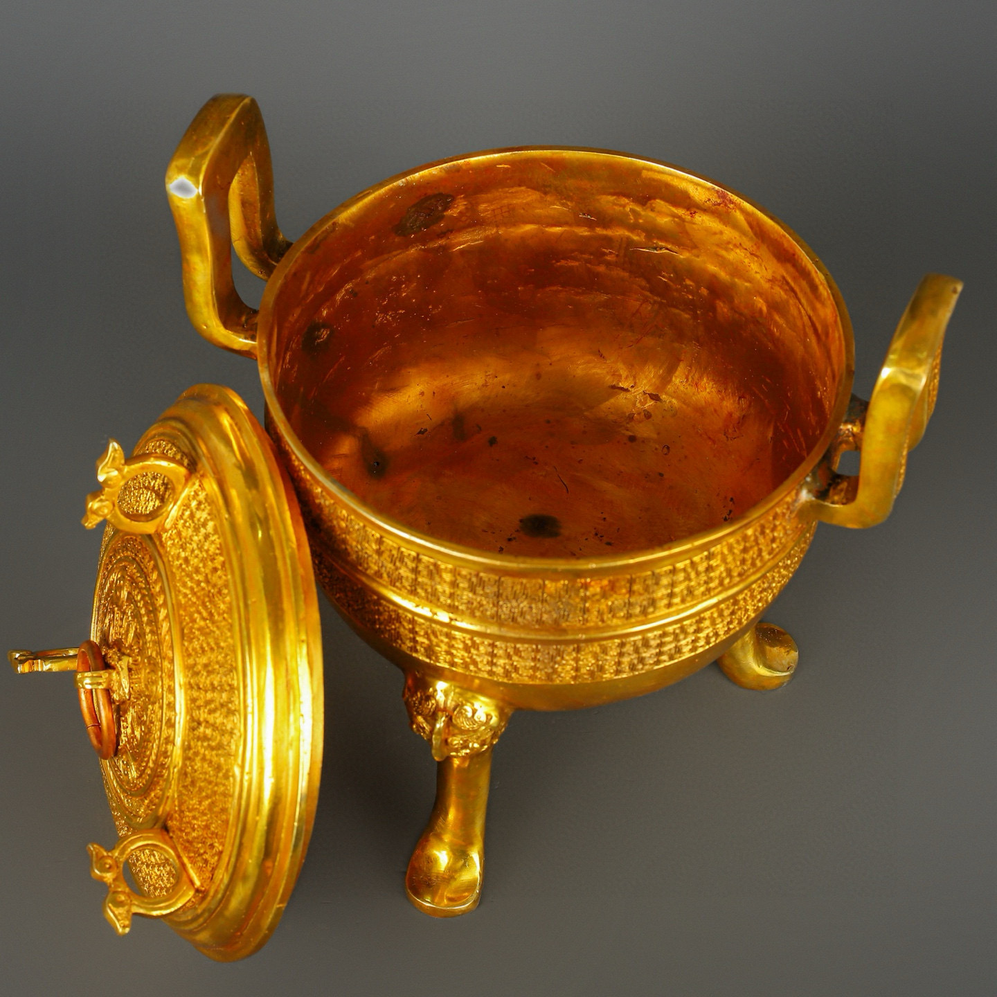 Han Dynasty gilt bronze and gold round tripod