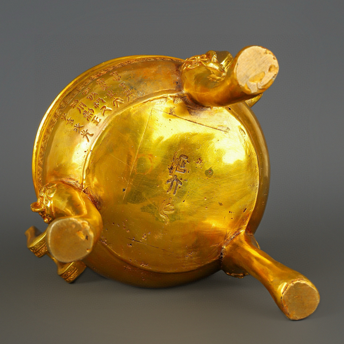 Han Dynasty gilt bronze and gold round tripod