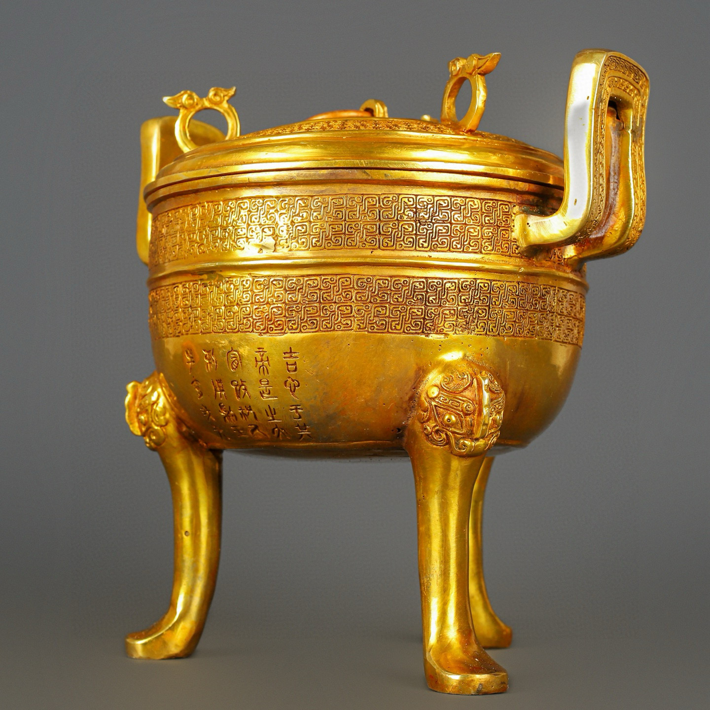 Han Dynasty gilt bronze and gold round tripod