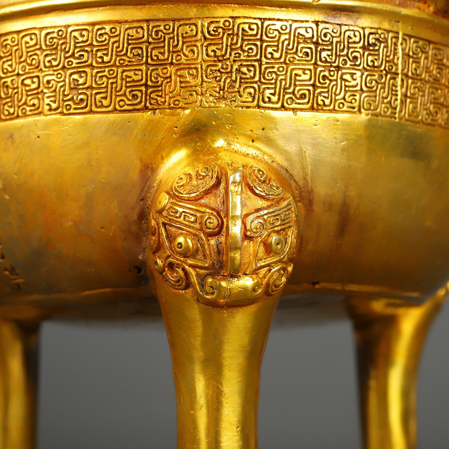 Han Dynasty gilt bronze and gold round tripod