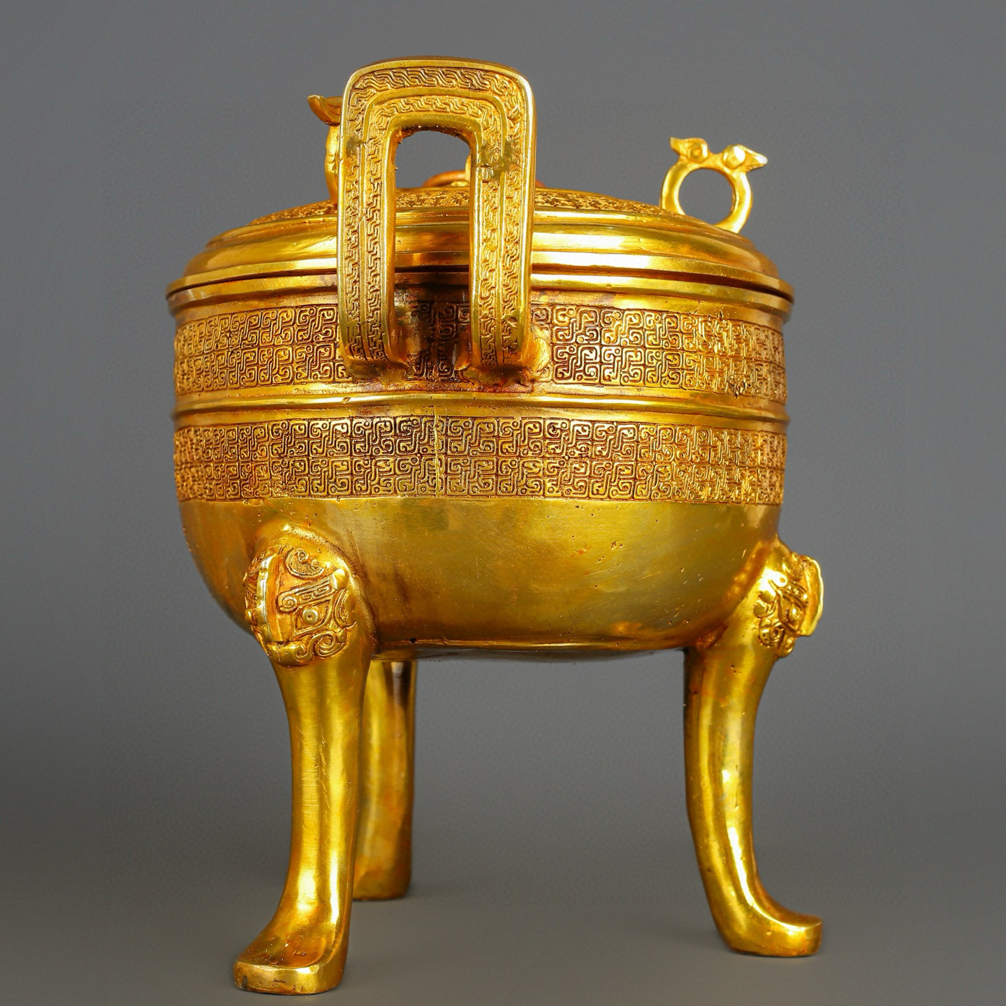 Han Dynasty gilt bronze and gold round tripod