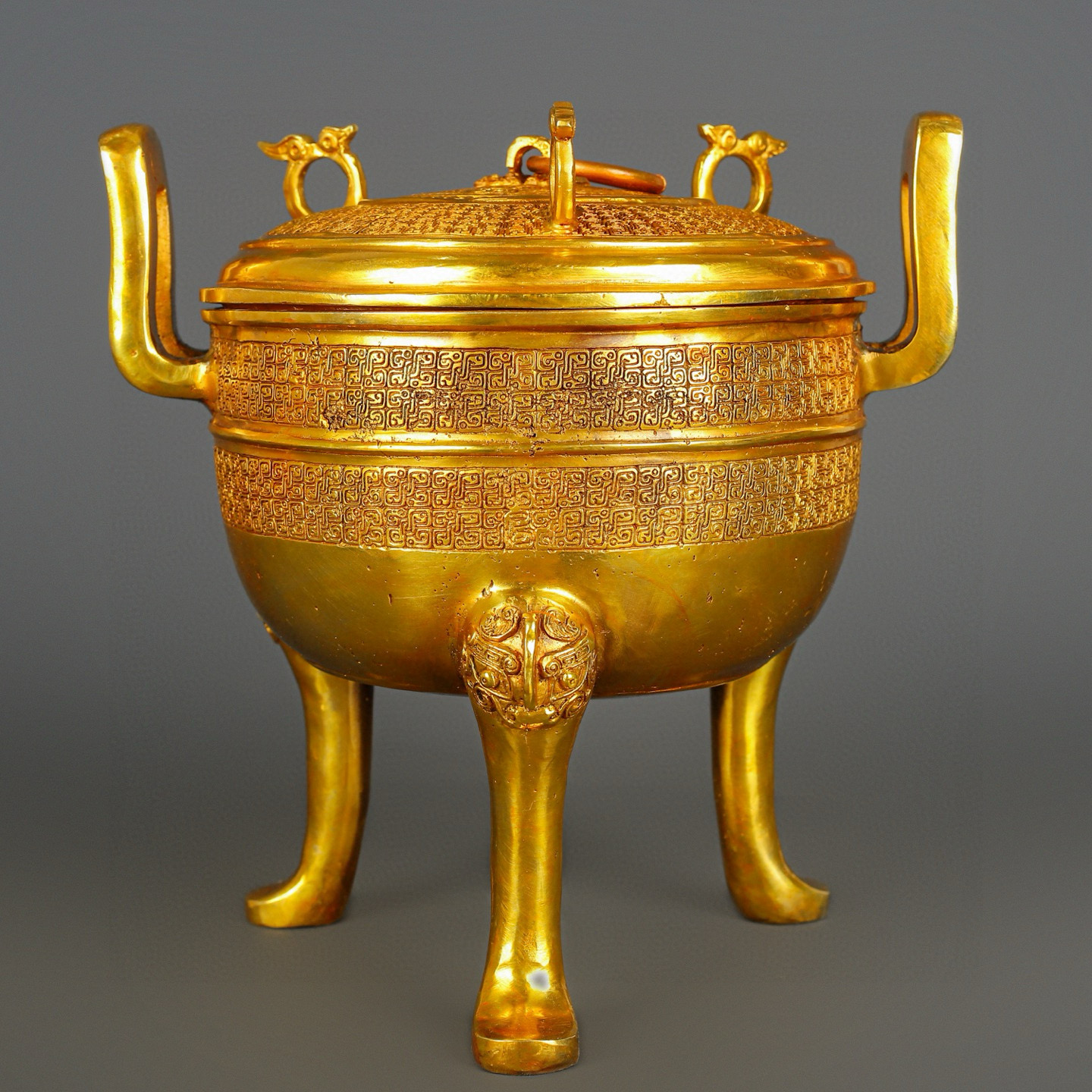Han Dynasty gilt bronze and gold round tripod