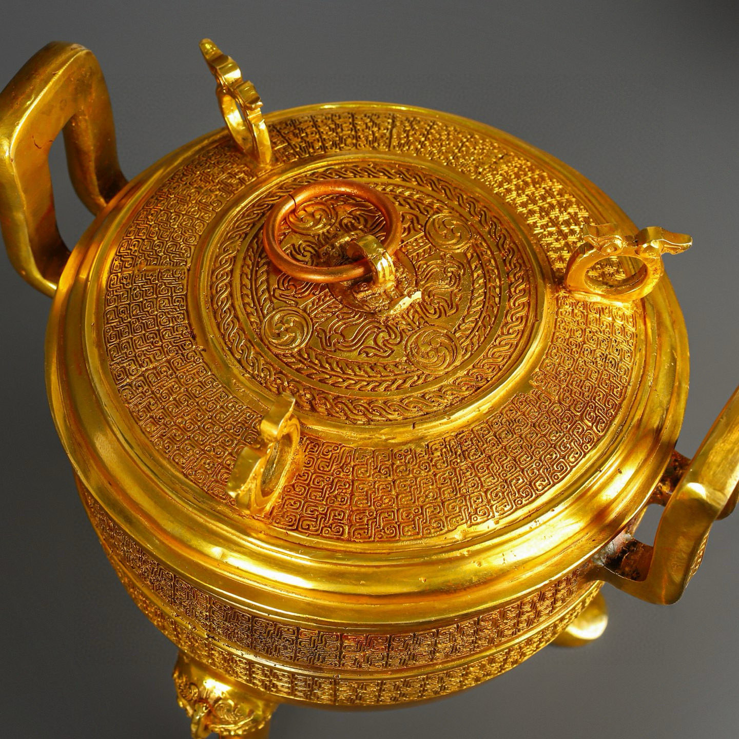 Han Dynasty gilt bronze and gold round tripod