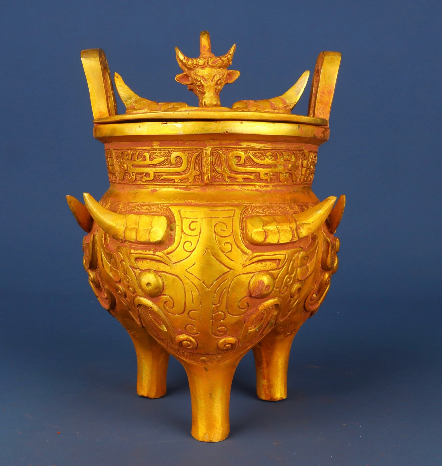 Zhou Dynasty Bronze gilt animal faced tripod