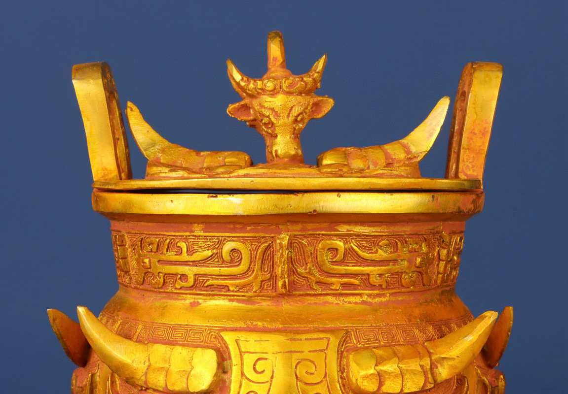Zhou Dynasty Bronze gilt animal faced tripod