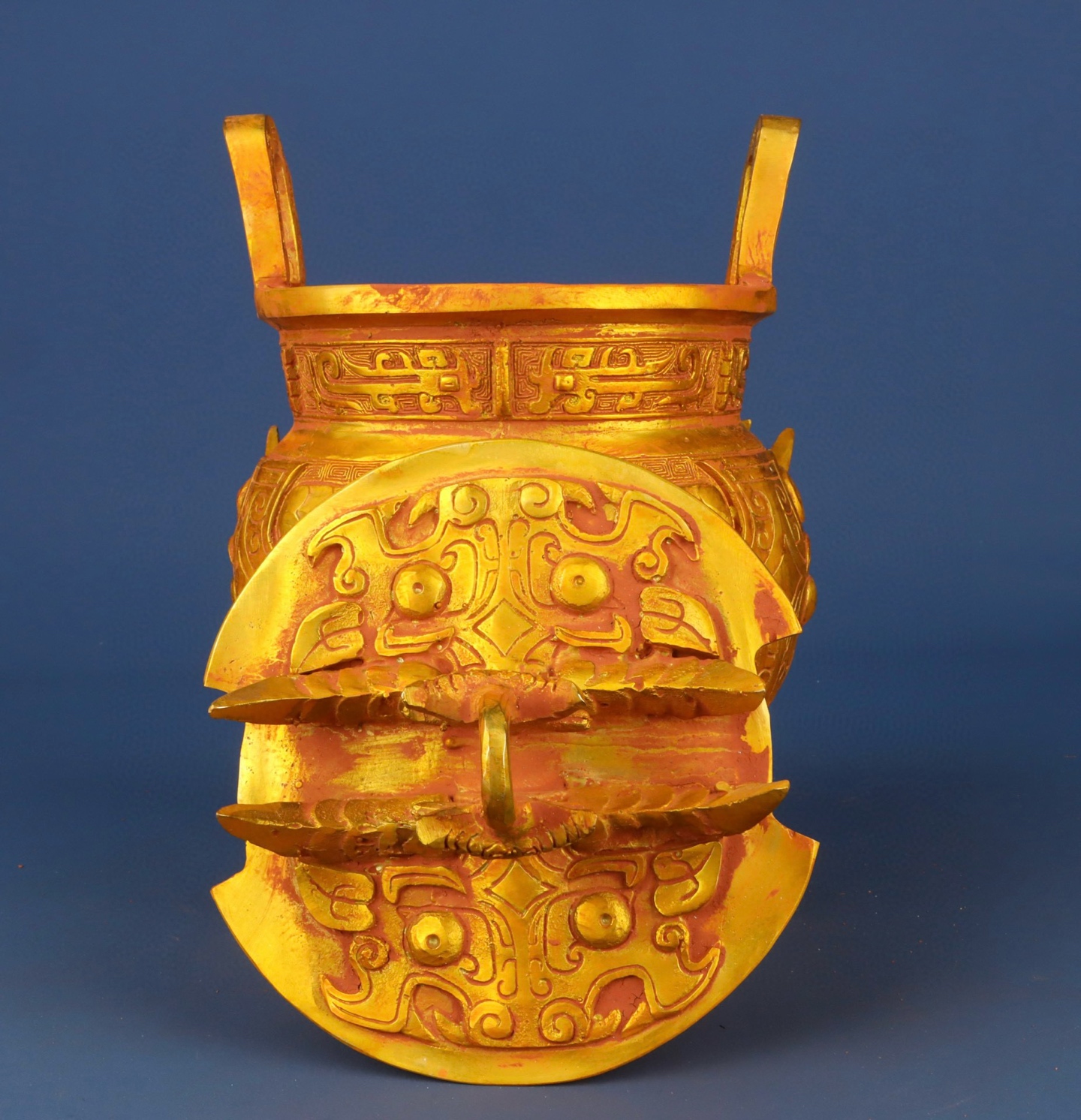 Zhou Dynasty Bronze gilt animal faced tripod