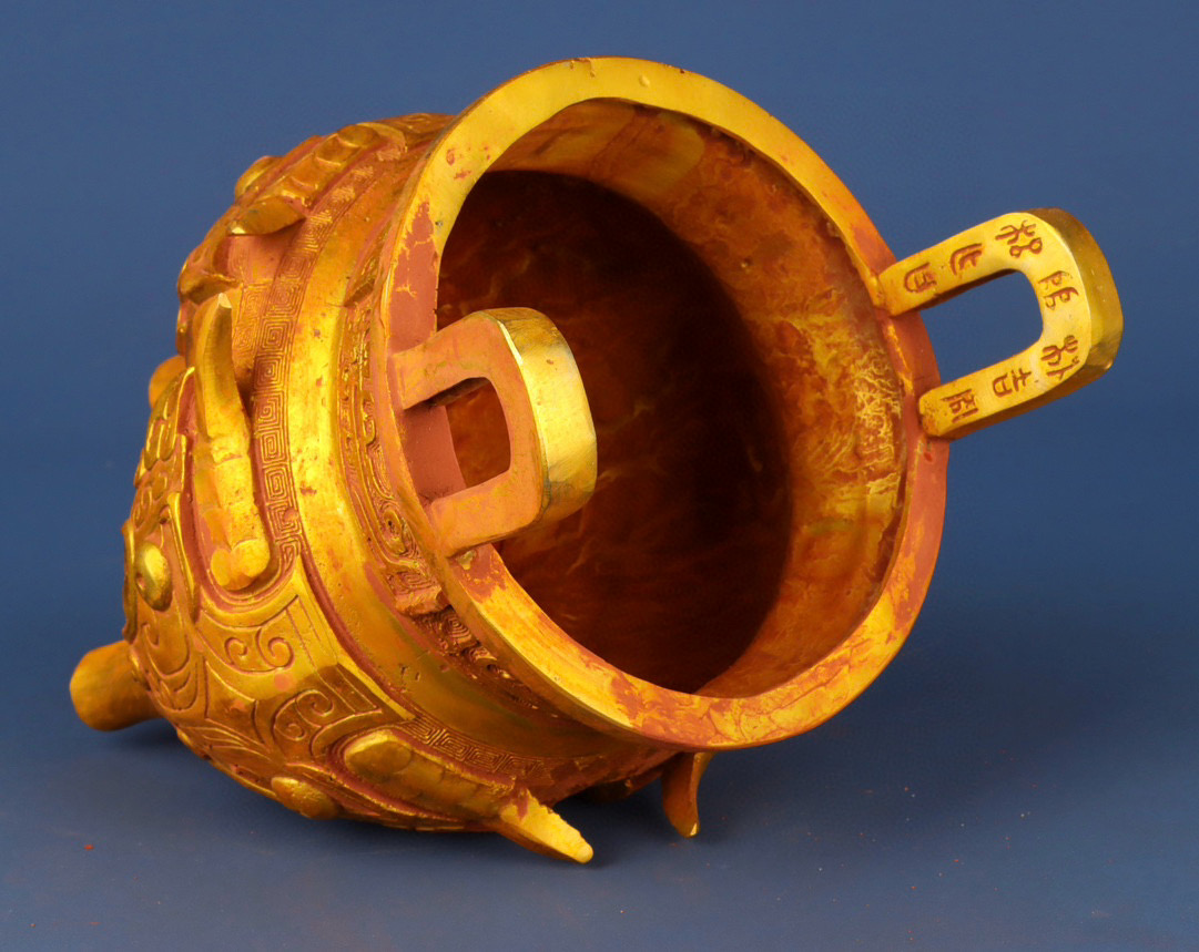 Zhou Dynasty Bronze gilt animal faced tripod