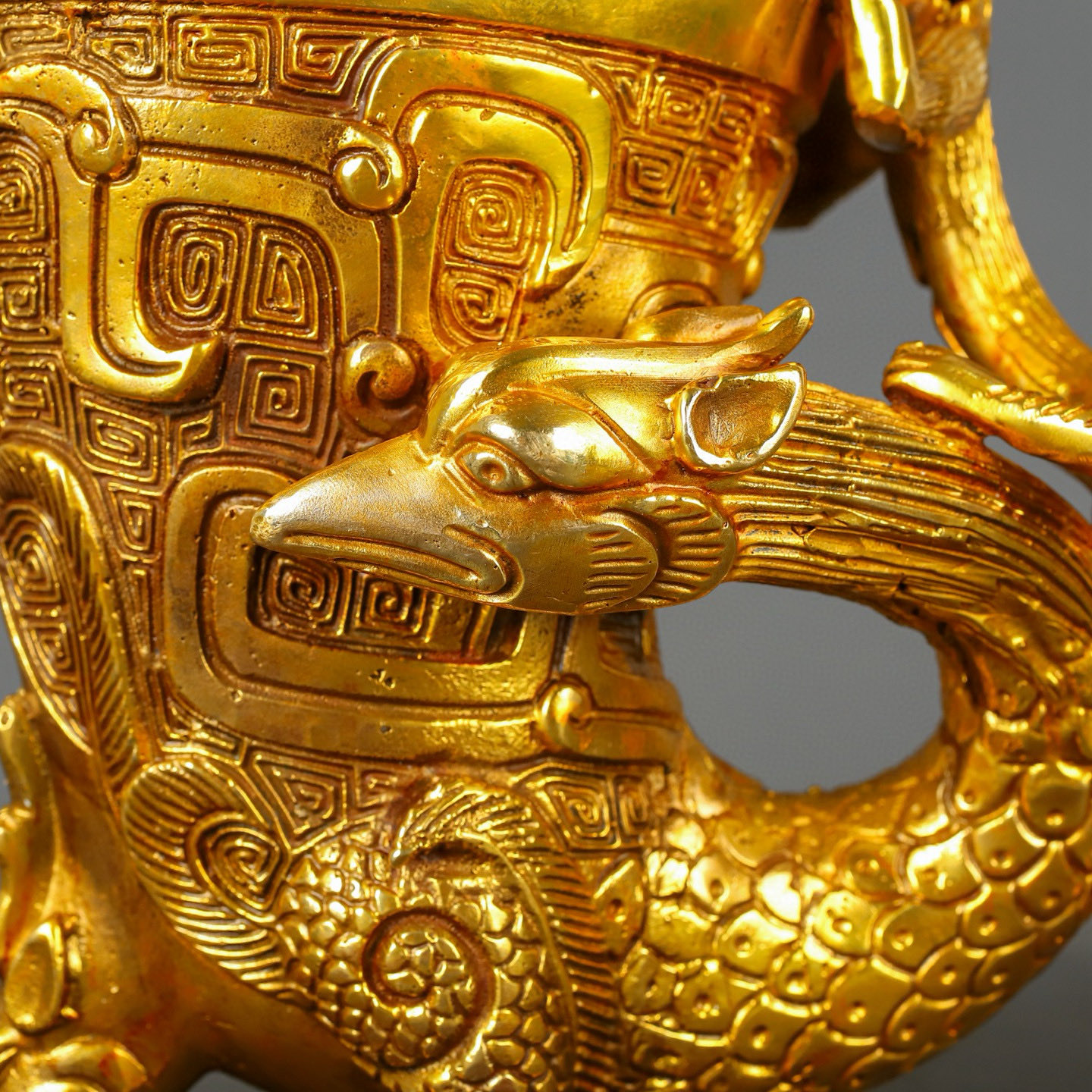 Han Dynasty gilt bronze dragon and phoenix cup