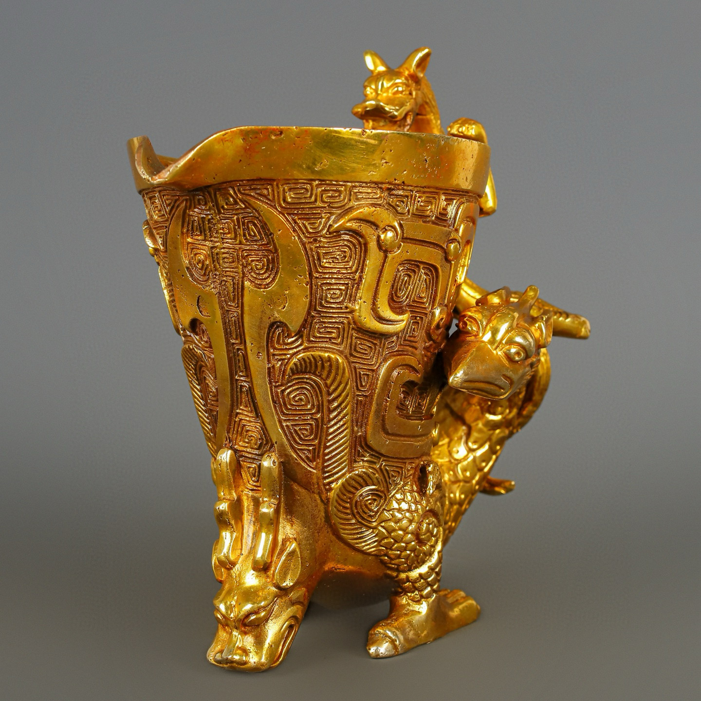 Han Dynasty gilt bronze dragon and phoenix cup