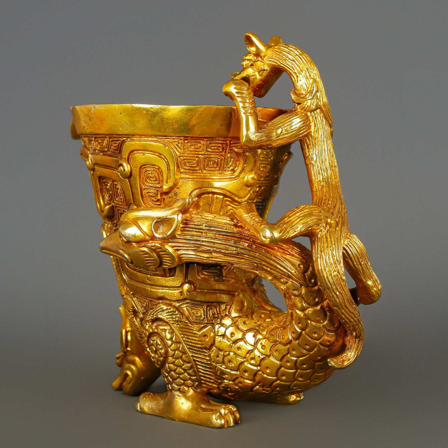 Han Dynasty gilt bronze dragon and phoenix cup