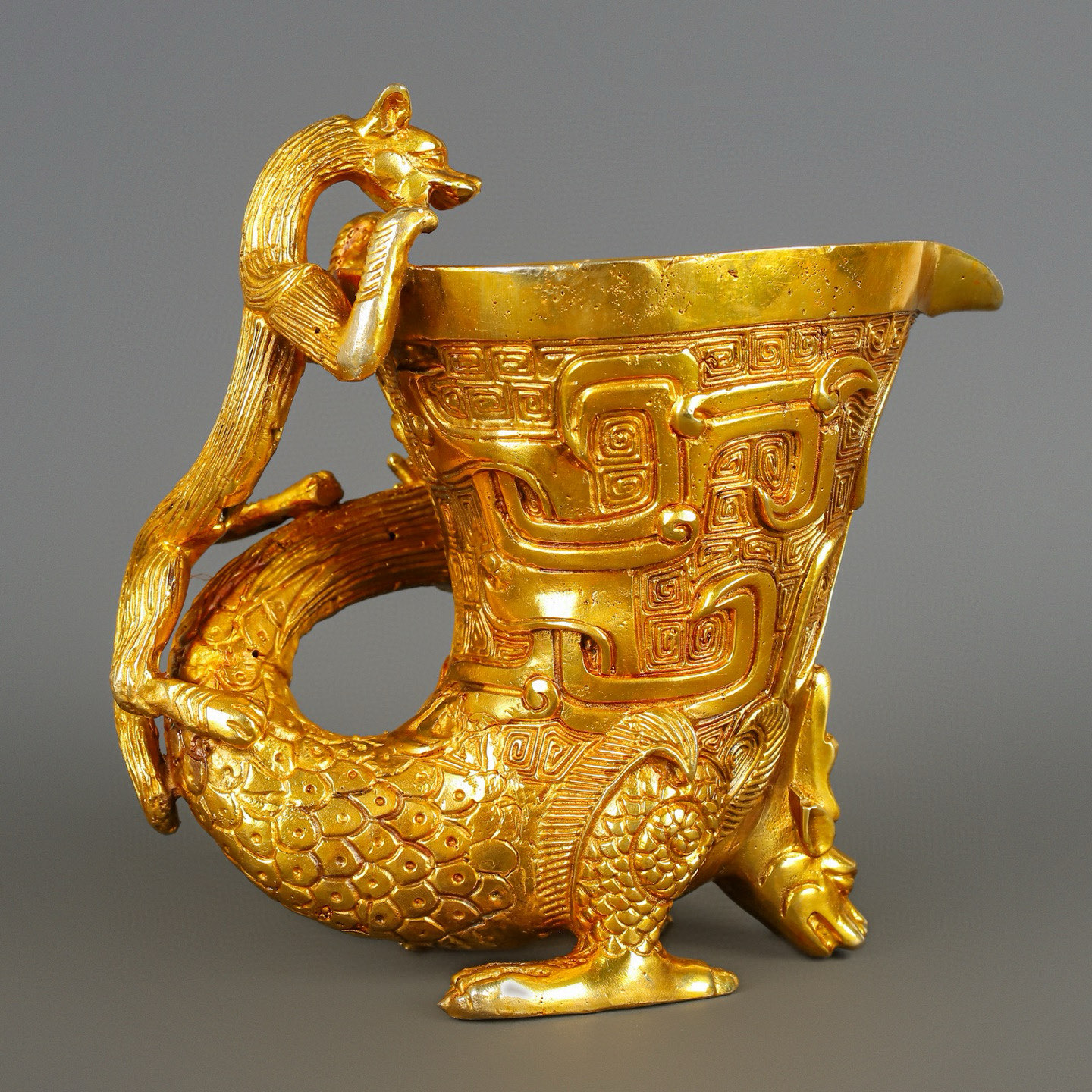 Han Dynasty gilt bronze dragon and phoenix cup