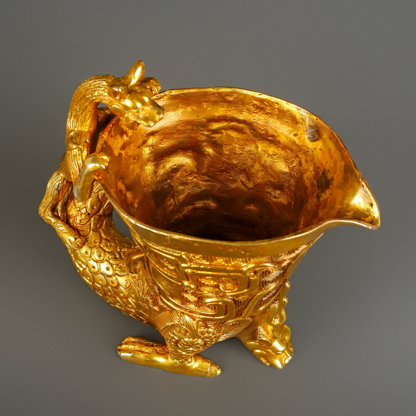 Han Dynasty gilt bronze dragon and phoenix cup