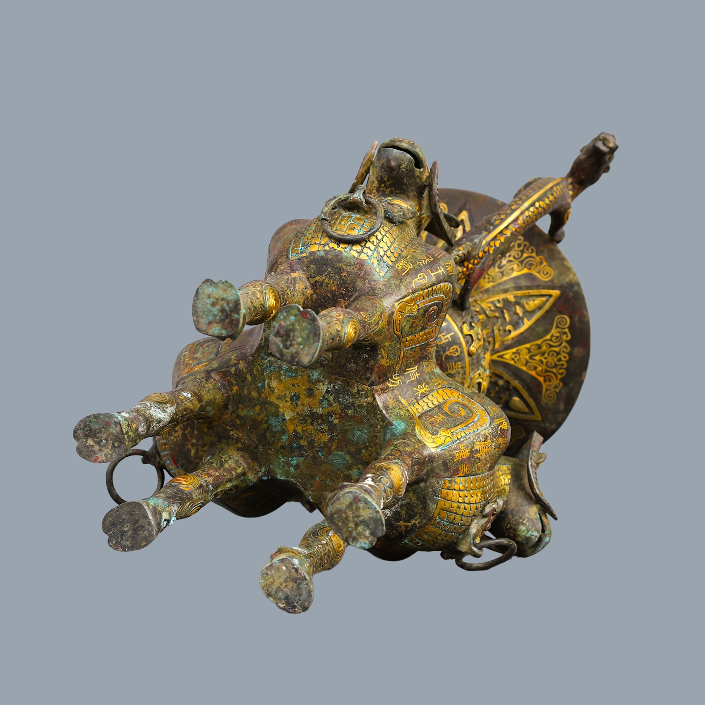 Han Dynasty Bronze and gold double dragon and three sheep statue