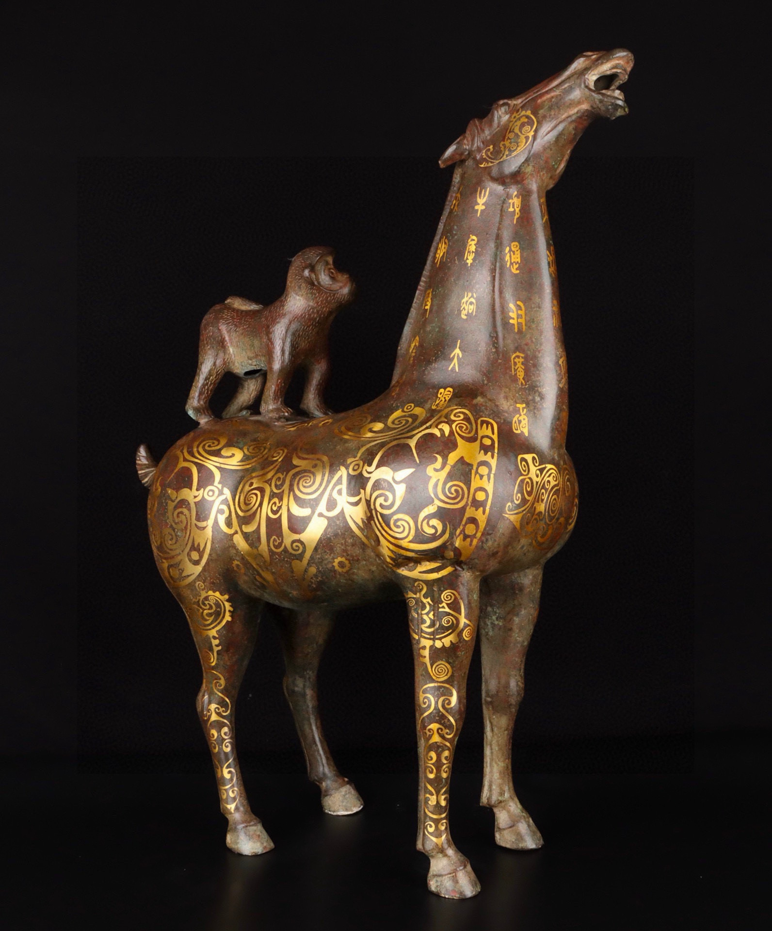 Han Dynasty Bronze and gold mounted monkey