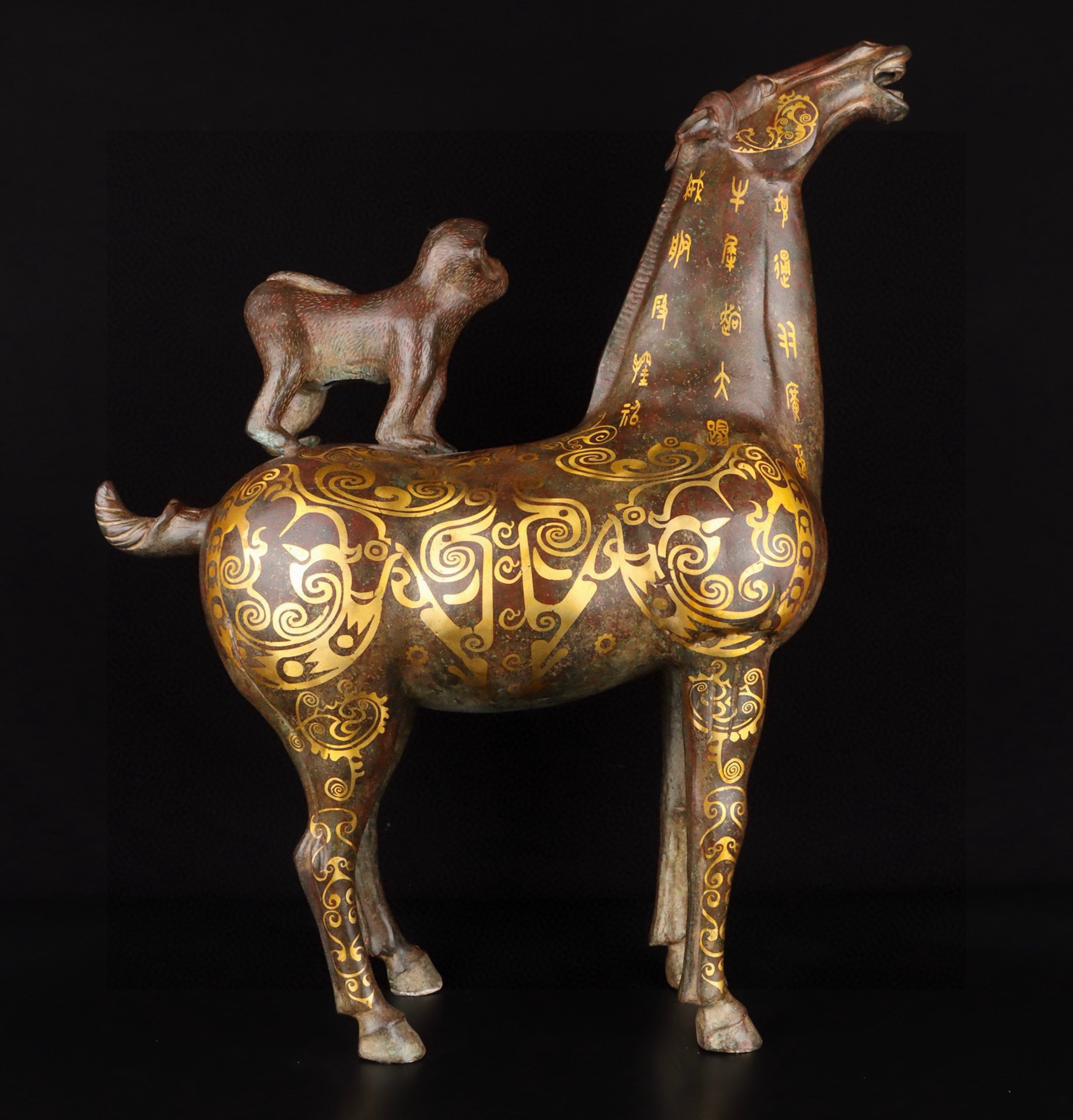 Han Dynasty Bronze and gold mounted monkey