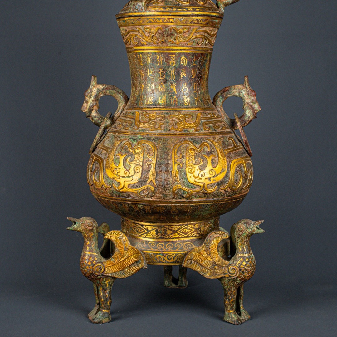 Han Dynasty Bronze and gold standing bird vase