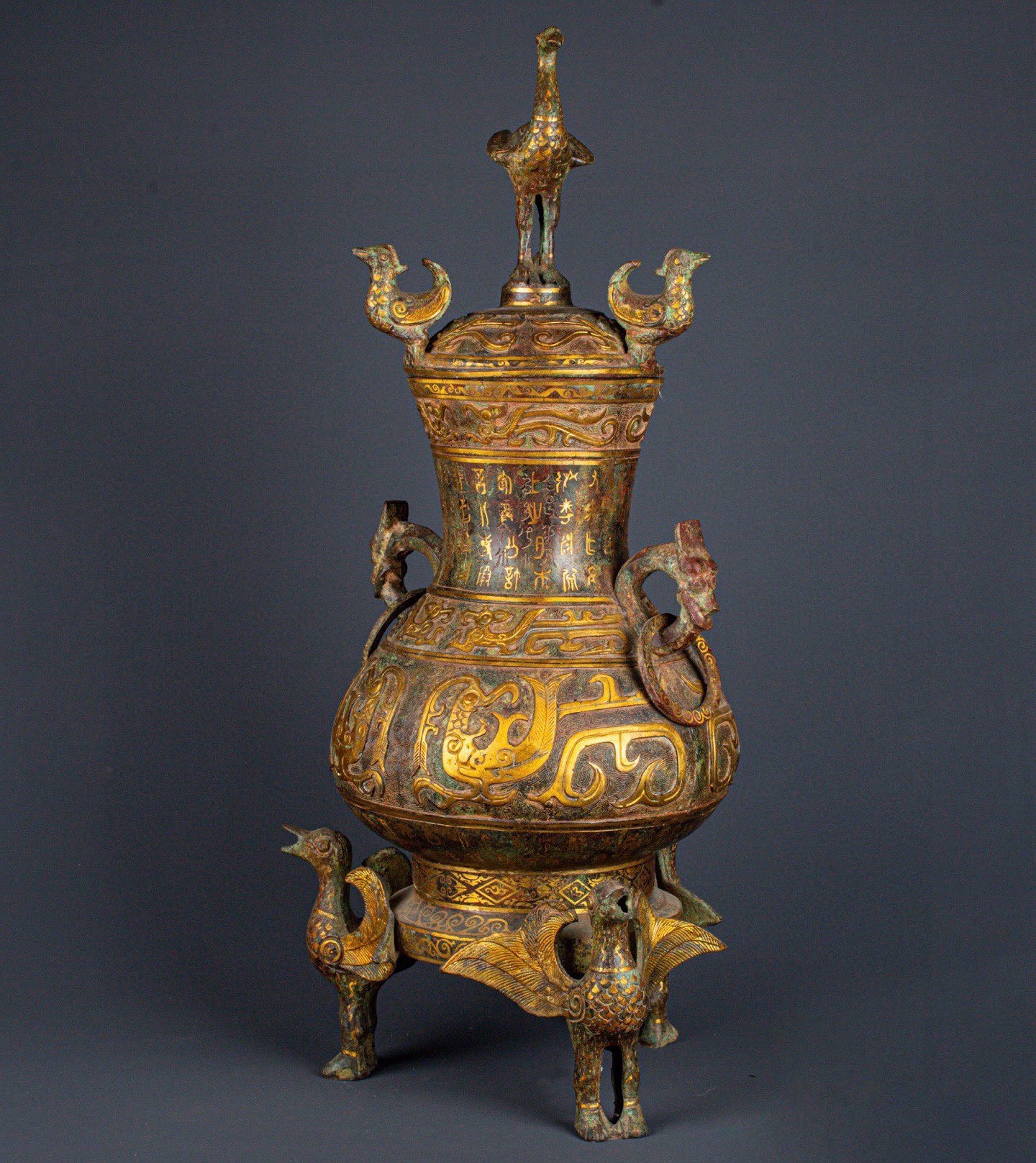 Han Dynasty Bronze and gold standing bird vase