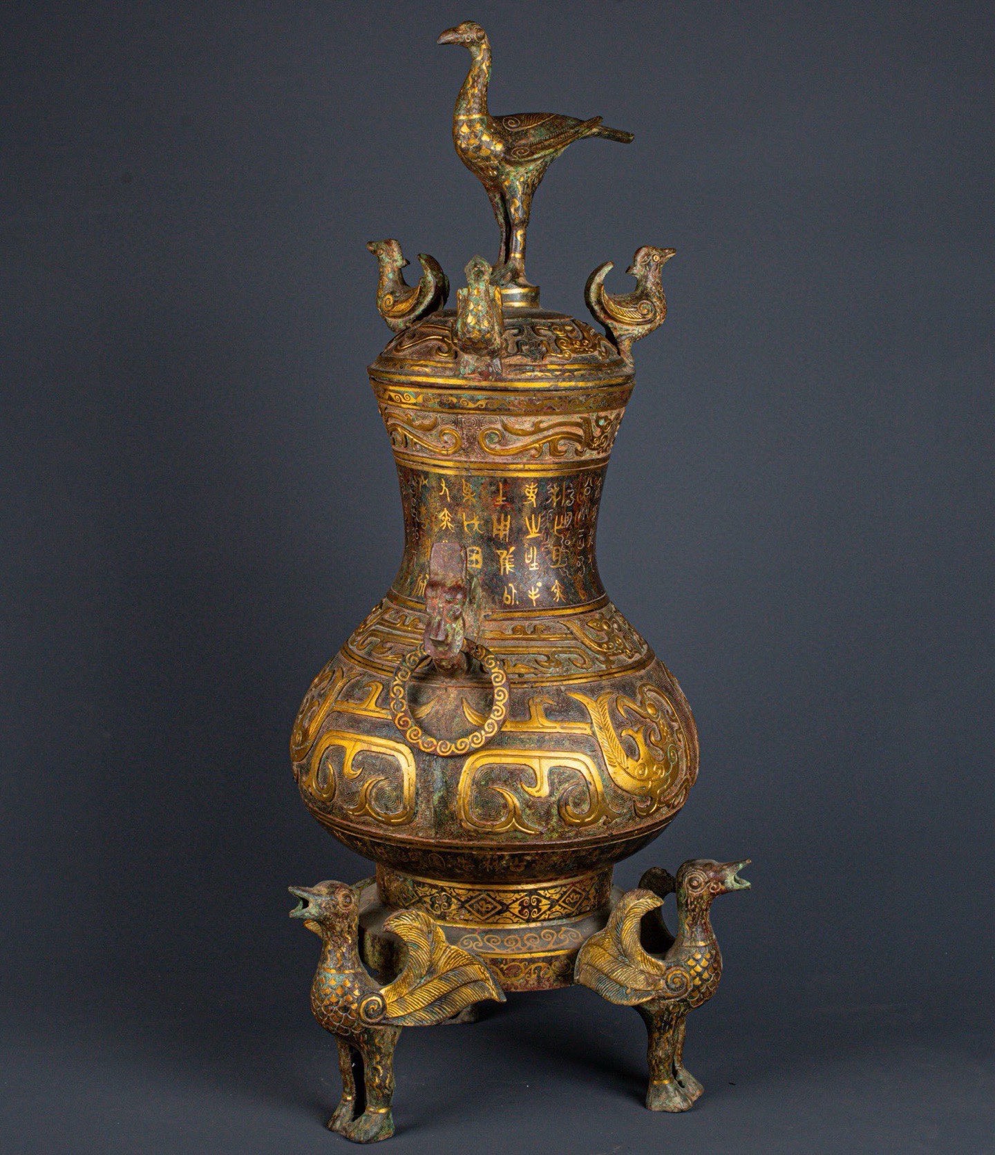 Han Dynasty Bronze and gold standing bird vase