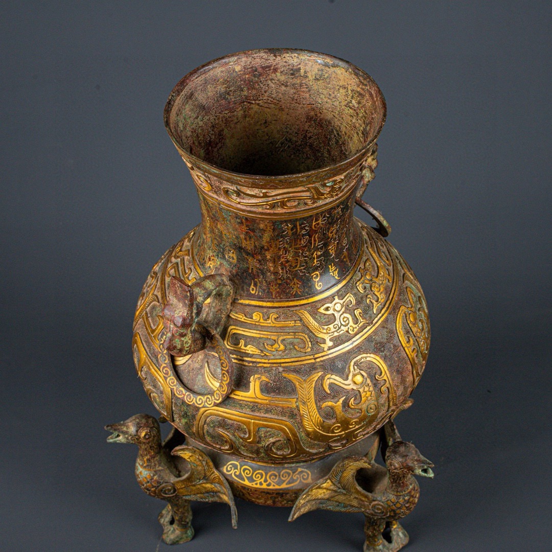 Han Dynasty Bronze and gold standing bird vase