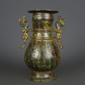 Zhou Dynasty Bronze inscribed double dragon round bottle