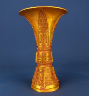 Zhou Dynasty Bronze gilt animal faced round statue