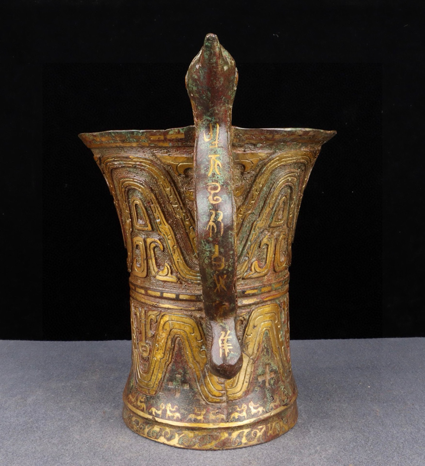Han Dynasty Bronze and gold double animal ear cup