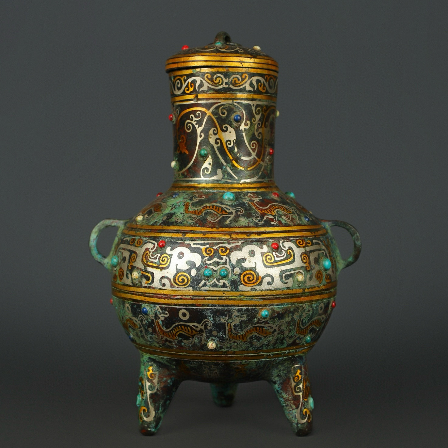 Han Dynasty Bronze gold and silver inlaid turquoise three legged jar