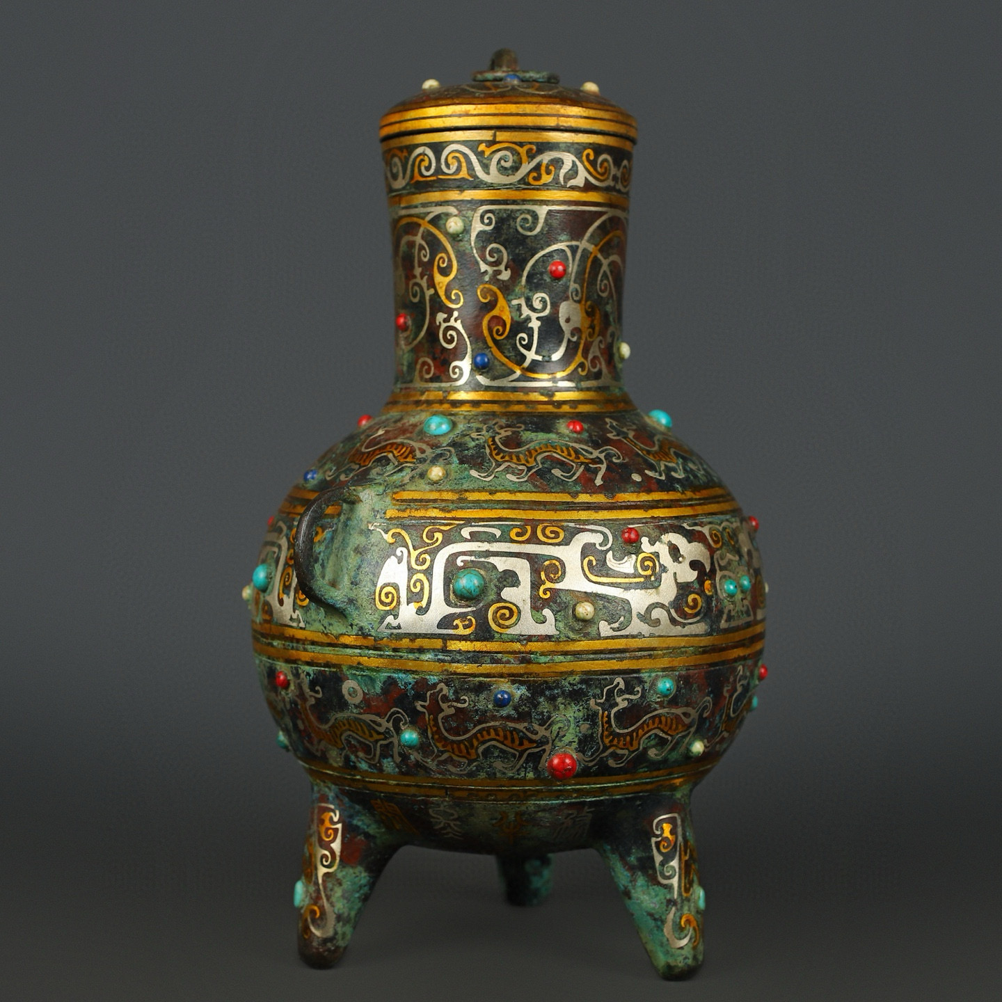 Han Dynasty Bronze gold and silver inlaid turquoise three legged jar
