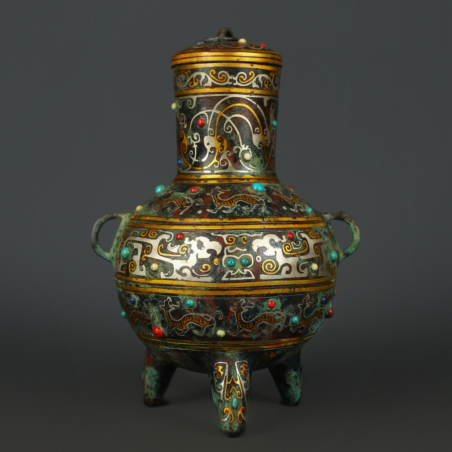 Han Dynasty Bronze gold and silver inlaid turquoise three legged jar