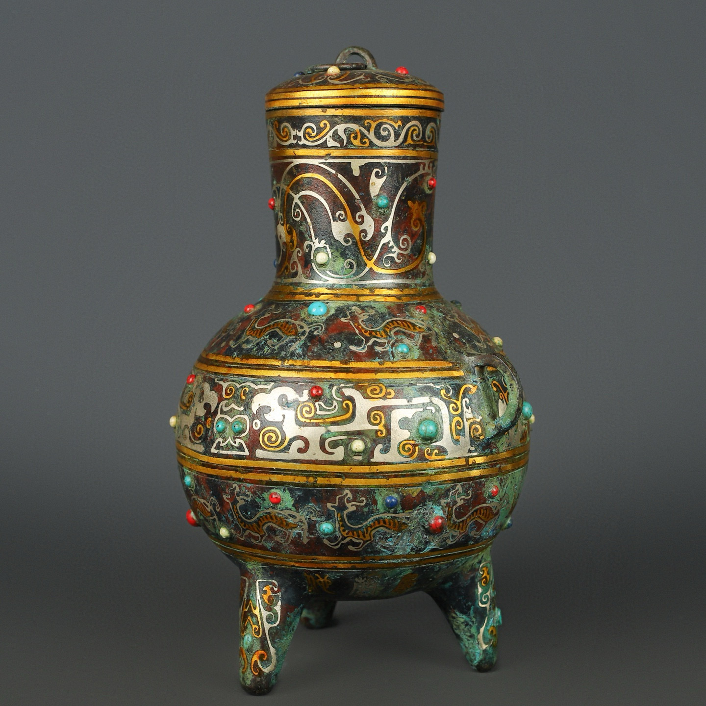 Han Dynasty Bronze gold and silver inlaid turquoise three legged jar