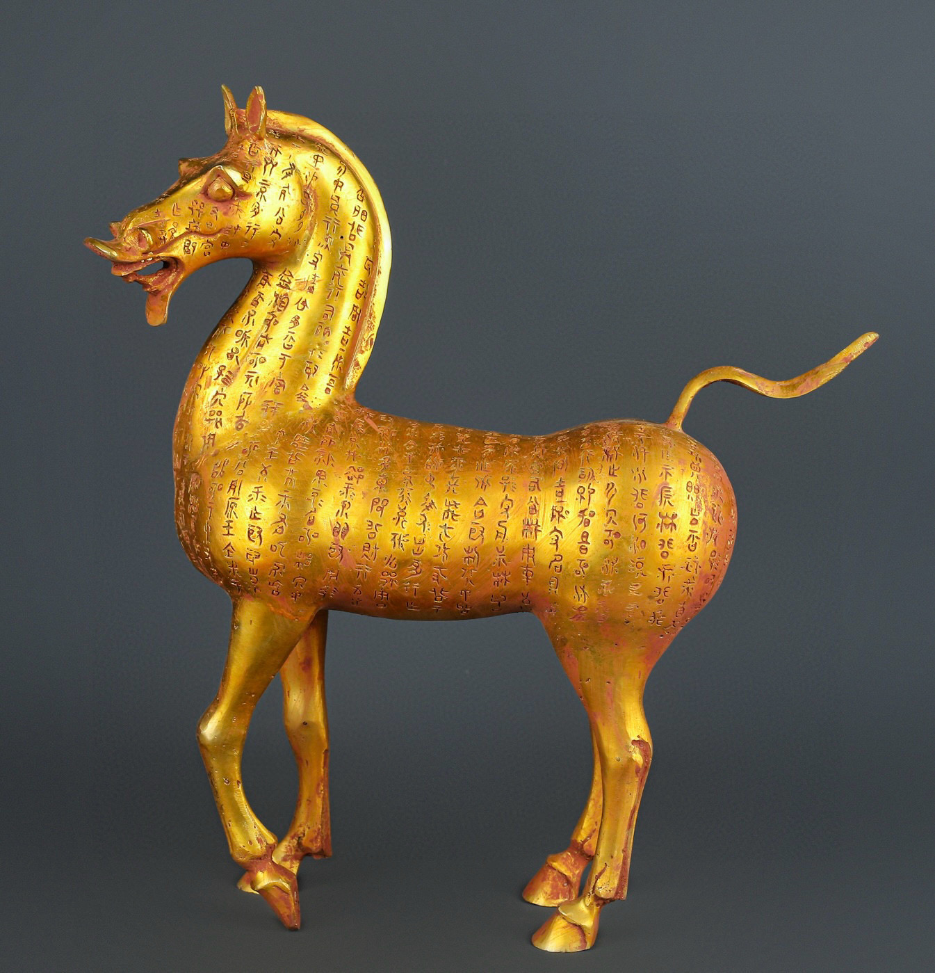 Han Dynasty gilt bronze horse with inscriptions