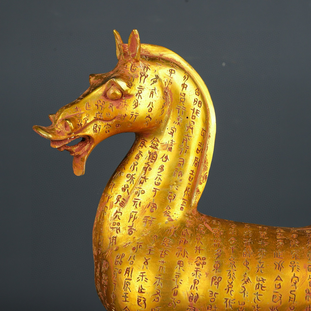 Han Dynasty gilt bronze horse with inscriptions