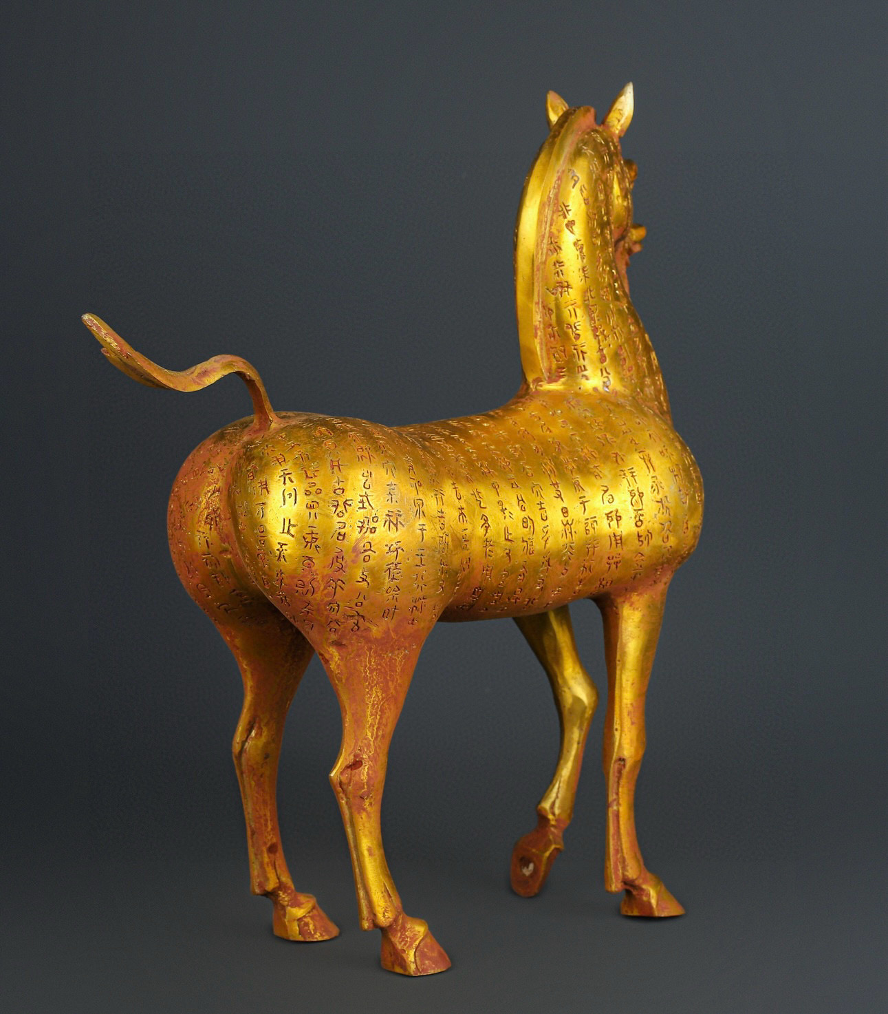 Han Dynasty gilt bronze horse with inscriptions