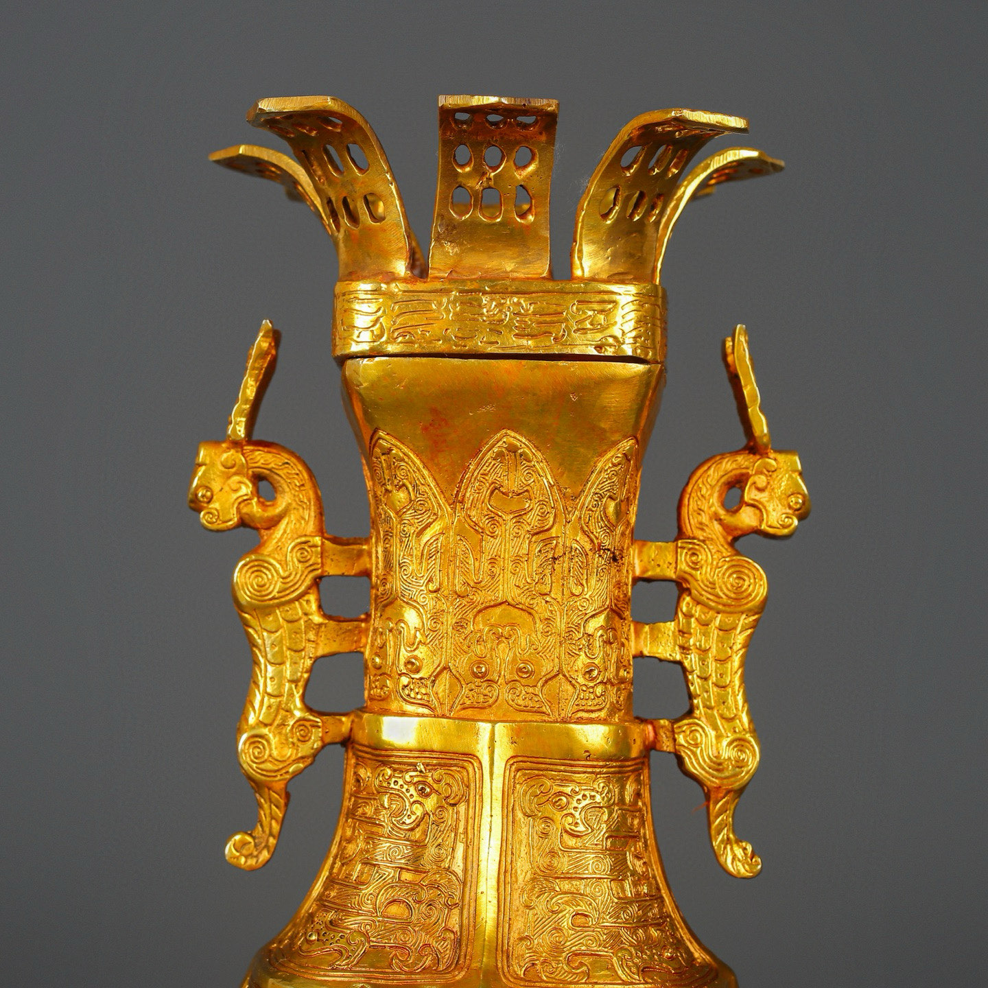 Han Dynasty gilt bronze and gold double dragon bottle